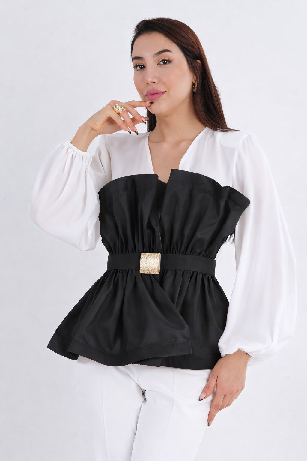 Mianotte V-Neck Peplum Blouse with Ruffled Overlay.